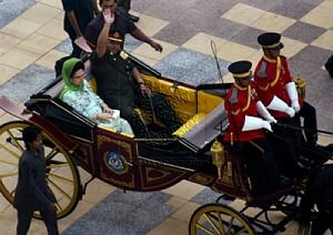 King and Queen rides carriage.jpg