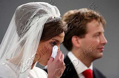 Prince Floris Wedding - Atmiee wipes away a tear as Floris looks on.jpg